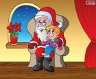 Küçük kız Noel Baba ile